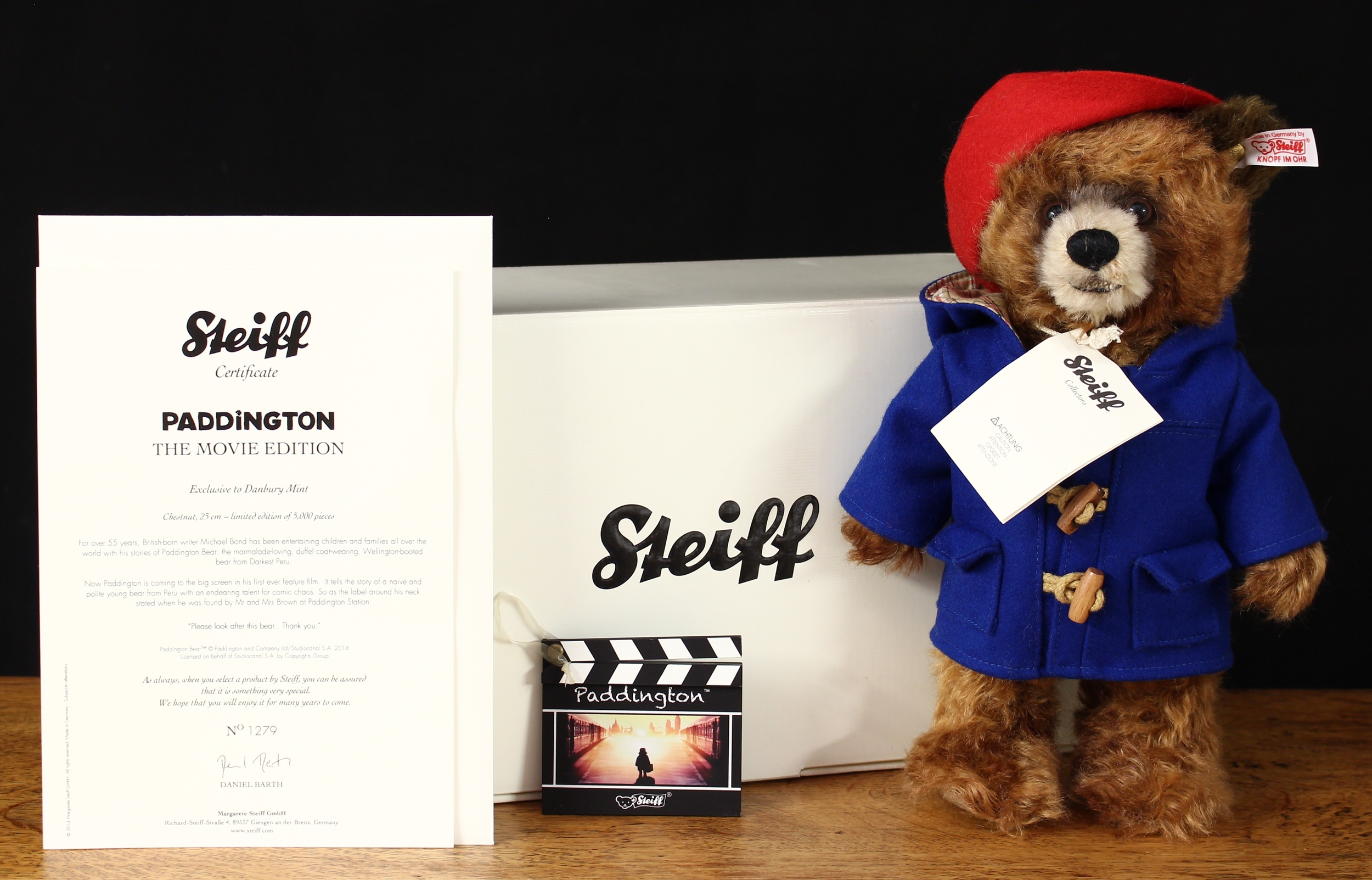 Steiff (Germany) 664656 Paddington teddy bear (the movie edition), exclusive to Danbury Mint, trademark Steiff button to ear with red and white tag, 25cm high, boxed with certificate and literature, Limited Edition No.1279 of 5,000