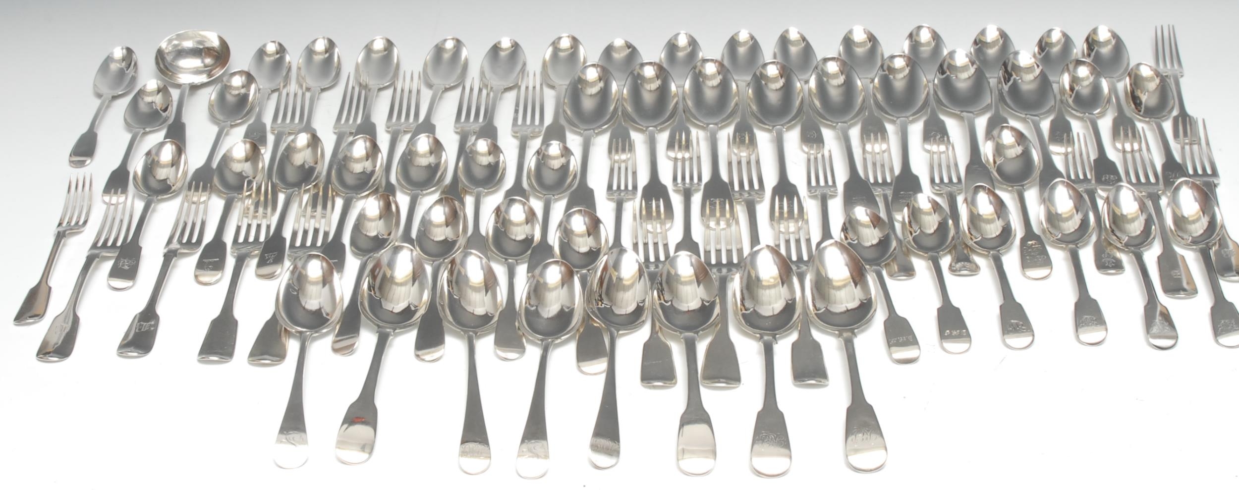 A set of six early Victorian silver Fiddle pattern table spoons, George W Adams, London 1845; a set of four early Victorian Provincial silver Fiddle pattern dessert spoons, Henry M Norris, Exeter 1839; other spoons and forks, various dates and makers (qty), 137.75oz