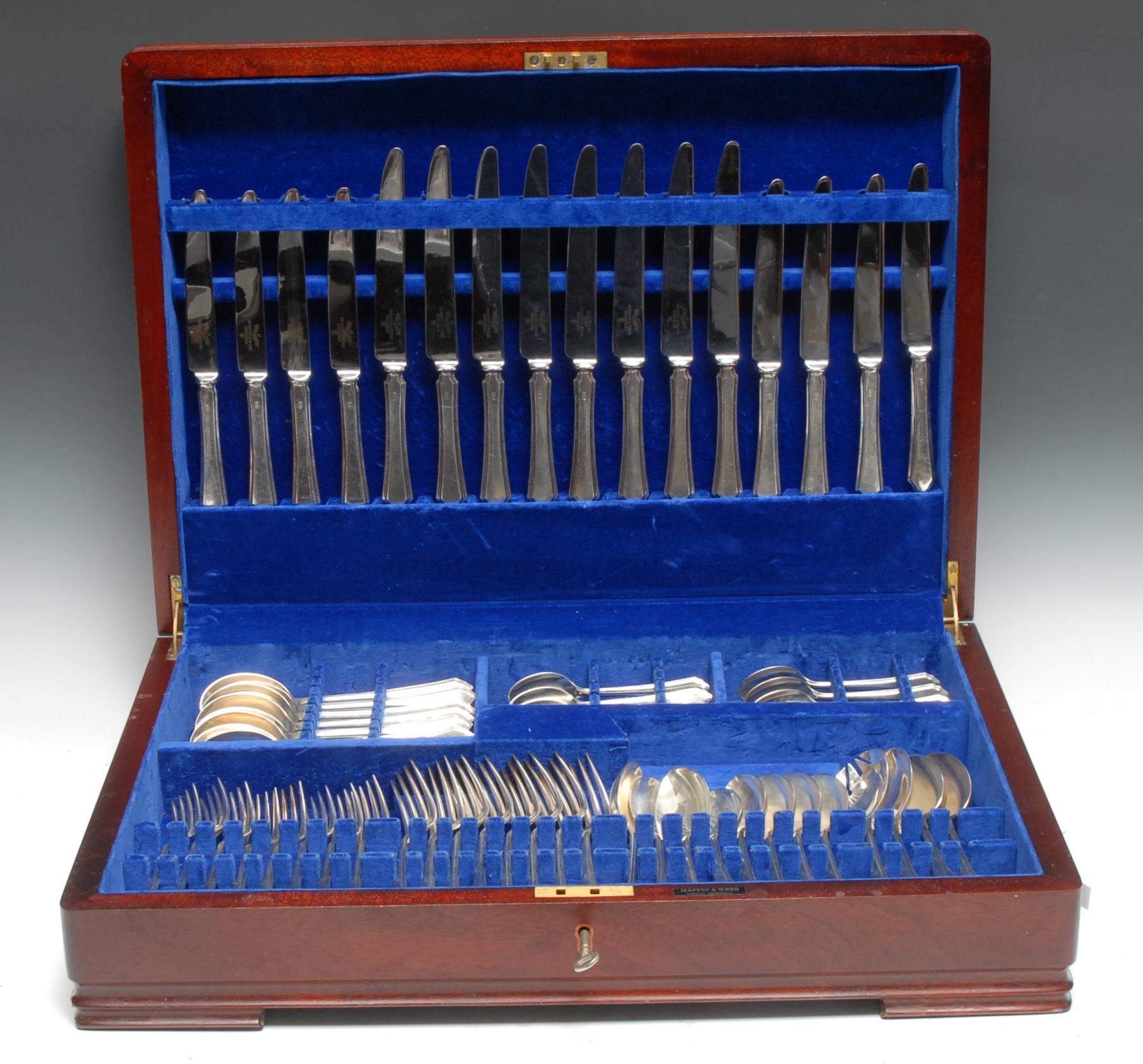 A silver Pembroke pattern canteen, for eight, comprising soup spoons,  dinner knives and forks, dessert knives forks and spoon, two table spoons, two fruit servers, twelve teaspoons, Mappin and Webb, Sheffield 1995, 87oz, cased