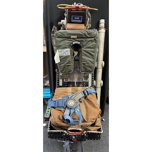 RAF Martin Baker MK 3JS Ejector seat taken from Gloster Javelin Jet Fighter Serial Number XJ117. This aircraft was built in 1960 and scrapped in 1974. The seat itself is serial no 364 and is dated 19-11-59. It is in unrestored original condition as it came out of the aircraft. It is complete with all data plates. The drogue parachute is complete in it's pack. There is a canvas head rest with webbing straps. It is marked as "Front XJ117" in two places. The seat has some other components still in place. Levers and knobs move correctly. It is covered in inspection stamps. In addition to the seat there are some other items in this lot to include: an Ejector Gun Tube Type 3 ref 27.L.368 which is marked "XA899 1st Pilot" taken fron Avro Vulcan V Bomber XA899 which as built in 1955 and scrapped in 1967. INERT & FFE: a Air Ministry marked parachute/kit bag: A Martin Baker Patent Horseshoe Pack back type Mk28 dated Nov 1978/Parachute assembly back type Mk44A. This also marked "Binbrook Lightning Feb 85": two small Parachute or Harness straps.