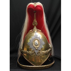 British Victorian 1871 Pattern Cavalry  Helmet. Brass skull with 5th Princess Charlotte of Wales Dragoon Guards regimental helmet plate to front with hobnail pattern star. Helmet has brass cross base and fluted plume holder which houses a falling red/white horse hair plume. Rosette to top of holder. Brass rosettes which hold the chin chain backed with black velvet. Underside of peak has remains of a  thin leather covering. Rear brim is leather covered. No liner or liner band.