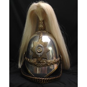 British Victorian 1871 Pattern Royal Berkshire Yeomanry Cavalry Helmet. Silvered skull. White Horse Hair Falling plume, missing boss. To each side, a brass rose head boss supports a modern replacement black felt backed brass chin chain. To the front is the helmet plate bearing the Regimental badge of Star & Crescent on a star backing. Black leather liner.