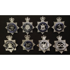 A collection of Queens Crown Police Officers enamelled cap badges: Kent County Constabulary: Nottinghamshire Combined Constabulary: Hampshire Constabulary: Southend on Sea Constabulary: Monmouthshire Constabulary: Staffordshire County Police: Brighton Police: Stoke On Trent City Police. (8)