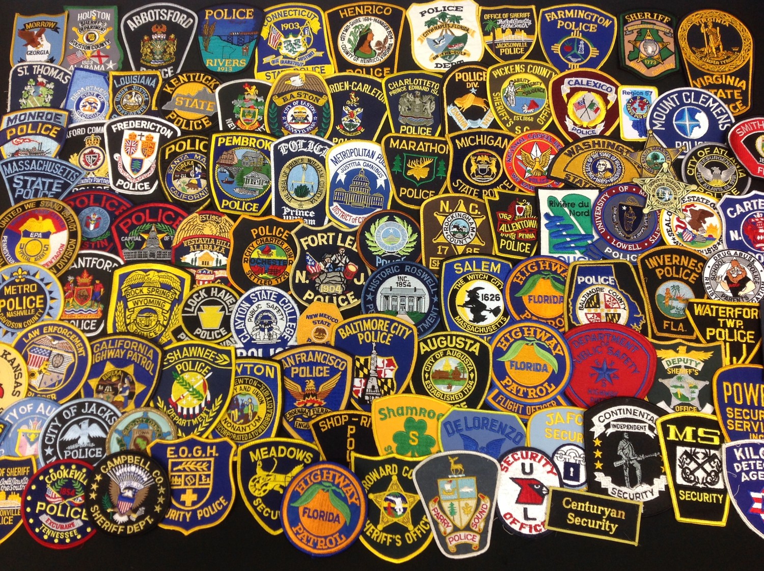 A very large collection of approx 230 plus US Police Shoulder Sleeve Insignias, plus private security Guard insignias. Please see all three photos.