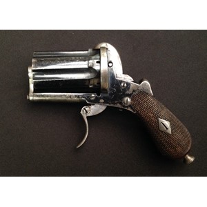 Pin Fire Pepperbox Pocket Pistol Revolver. 7mm Bore. Six shot. Cylinder length 45mm. Folding Trigger. English Proof marks. Cyclinder marked with "Crown B". No makers markings. Working double action. Much original finish still present. Overall length 115mm. Section 58, no licence required.