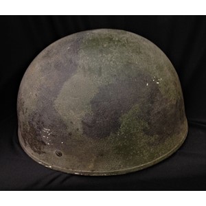 British Helmet Steel, Airborne Troops. MkIII Pattern helmet with original paint with black overpainted camo pattern. Complete with leather liner by BMB, size 6 7/8ths, dated 1949 and with web chinstrap with leather chincup. A press stud has been sewn to the end of the chinstrap to allow a quick release. Cushion Pad in the crown is loose. Original owners name written in ink to the sweatband "Pte Harrison 24171642".
