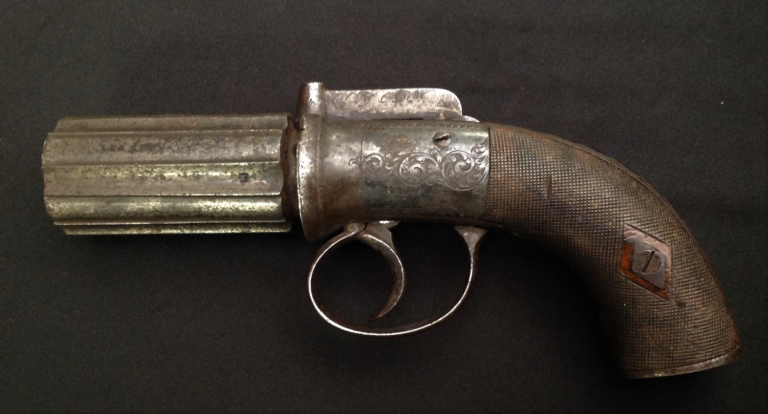 Pepperbox Pistol with approx 9mm bore, six shot cyclinder. No makers markings. English Proof Marks. Overall length approx 200mm. Action will function but a little loose. Section 58, no licence required.
