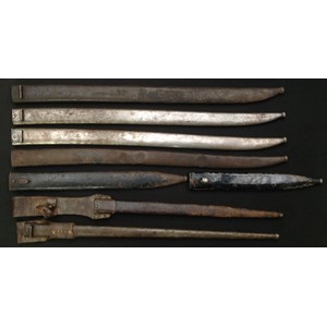 A collection of Eight Bayonet scabbards only: to include French 1866 pattern Chassepot, French Gras, WW1 German Mauser, etc. (8)