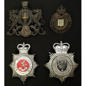 King Crown Isle of Wight Police Night Plate: City of London Police A139 Night Plate: Queens Crown Kent Constabulary enamelled Helmet Plate: Queens Crown Essex and Southend-on-Sea Constabulary Helmet Plate.  (4)