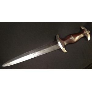WW2 Third Reich SA Dienstdolch SA Dagger with 210mm long double edged blade with "Alles Fur Deutschland" motto and makers mark for "Herm. Konejung, Solingen". Crossguard is SA Gruppe marked "B" for Berlin-Brandenburg. Overall length 336mm. Guards are early nickle silver examples. Wooden grip with some chips and cracks but complete with eagle and SA insignias. No scabbard.