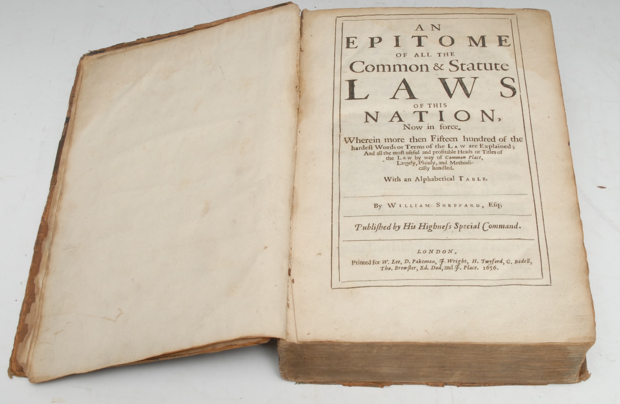 Legal History, the Commonwealth of England & the Cromwellian Protectorate - Sheppard (William), An Epitome of all the Common & Statute Laws of this Nation, Now in force. Wherein more than Fifteen hundred of the hardest Words or Terms of the Law are Explained; And all the most useful and profitable Heads or Titles of the Law by way of Common Place, Largely, Plainly, and Methodically handled. With an Alphabetical Tables, first edition, London: Printed for W. Lee [...], 1656, printed in Roman and Italic, black-ruled title-page, historiated and foliate initials, collates complete: [A1-A4], b-e2, B- [I4], K-[T4], V-[V4], X-Z4, Aa-[Ii4], Kk-[Tt4], Vv-[Vv4], Xx-[Zz4], Aaa-[Iii4], Kkk-[Uuu4], Xxx-[Zzz4], Aaaa-[Iiii4], Kkkk-[Uuuu4], Xxxx-[Zzzz4], Aaaaa-[Iiiii4], Kkkkk-[Uuuuu4], Xxxxx-[Zzzzz4], Aaaaaa-[Iiiiii4], Kkkkkk-[Uuuuuu4], Xxxxxx-[Zzzzzz4], Aaaaaaa-[Eeeeeee2], contemporary legal calf, blind-ruled, lower-cover exposed board only, spine perished in places but holding, the top fore-edge horizontally inscribed with the author's surname, 4to, [1]