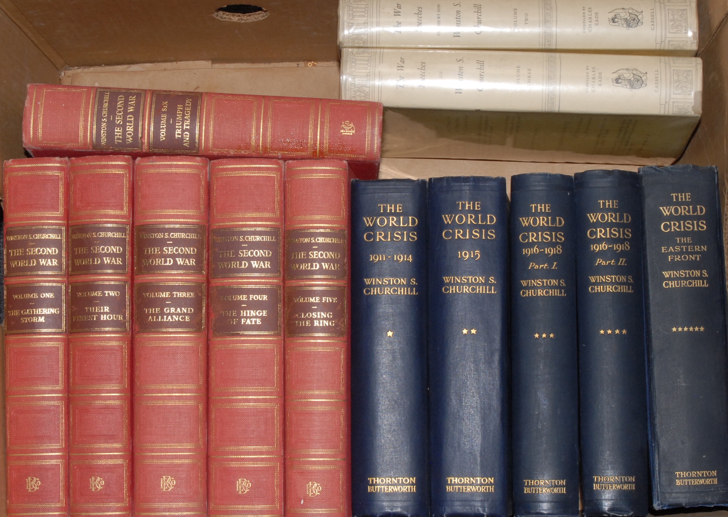 Winston Spencer Churchill - The World Crisis, five volumes only (of six, lacking V: Aftermath), mixed editions and impressions, London: Thornton Butterworth Limited, 1924-1931, illustrated with plates, in-text illustrations and maps, contemporary blue cloth gilt, 8vo, (5); Eade (Charles, compiler), The War Speeches, volumes II & III only, second edition, London: Cassell, 1964-1965, titles printed in red and black, pictorial dustjackets over blue cloth boards, 8vo, (2); The Second World War, six-volume set, the "Chartwell" Edition", London: The Educational Book Company Ltd, [n.d., c. 1960], illustrated, contemporary red cloth, top-edges stained red, 8vo, (6), [13]