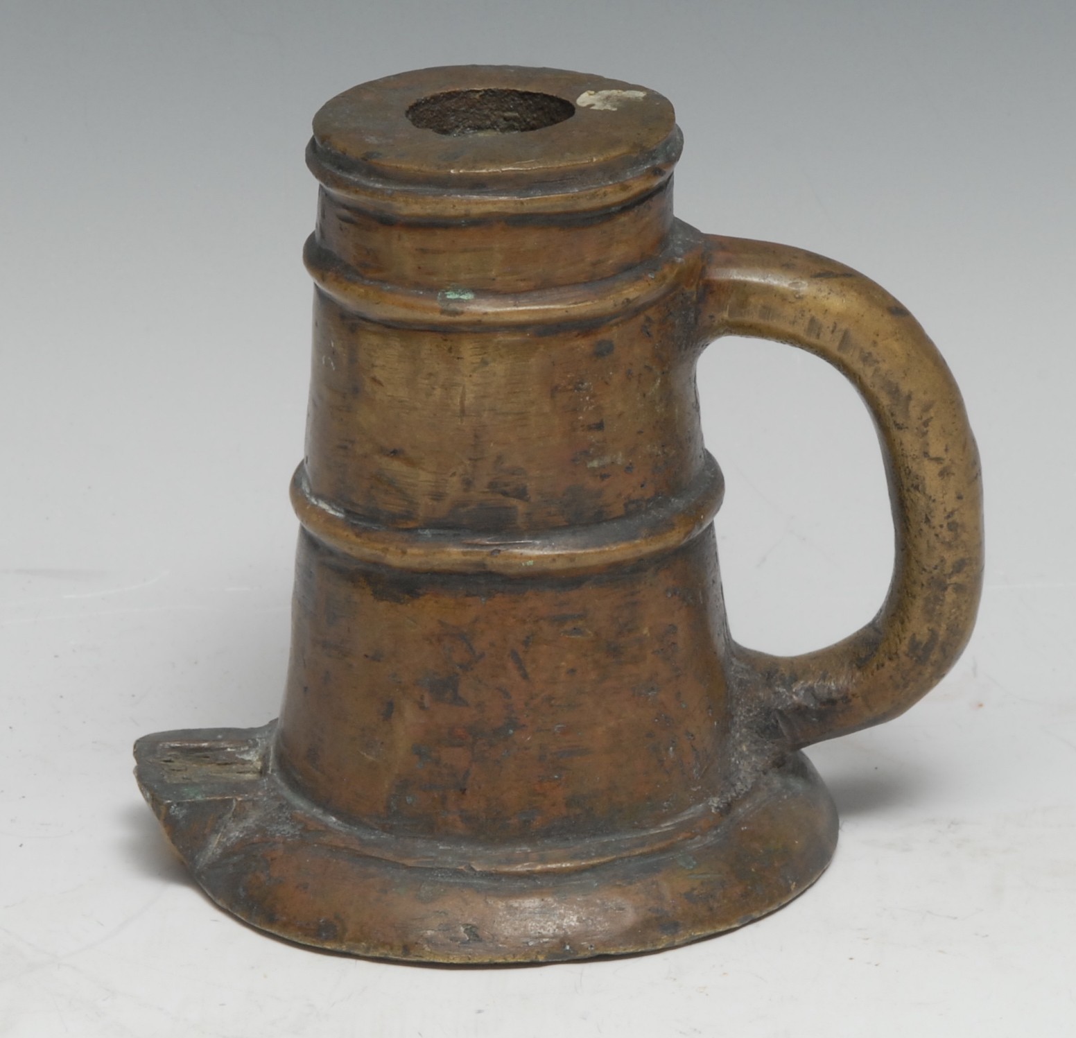 A 17th/18th century bronze thunder mug signal cannon, loop handle, quarter and centre girdles, spreading base, 12.5cm high, c.1650-1750