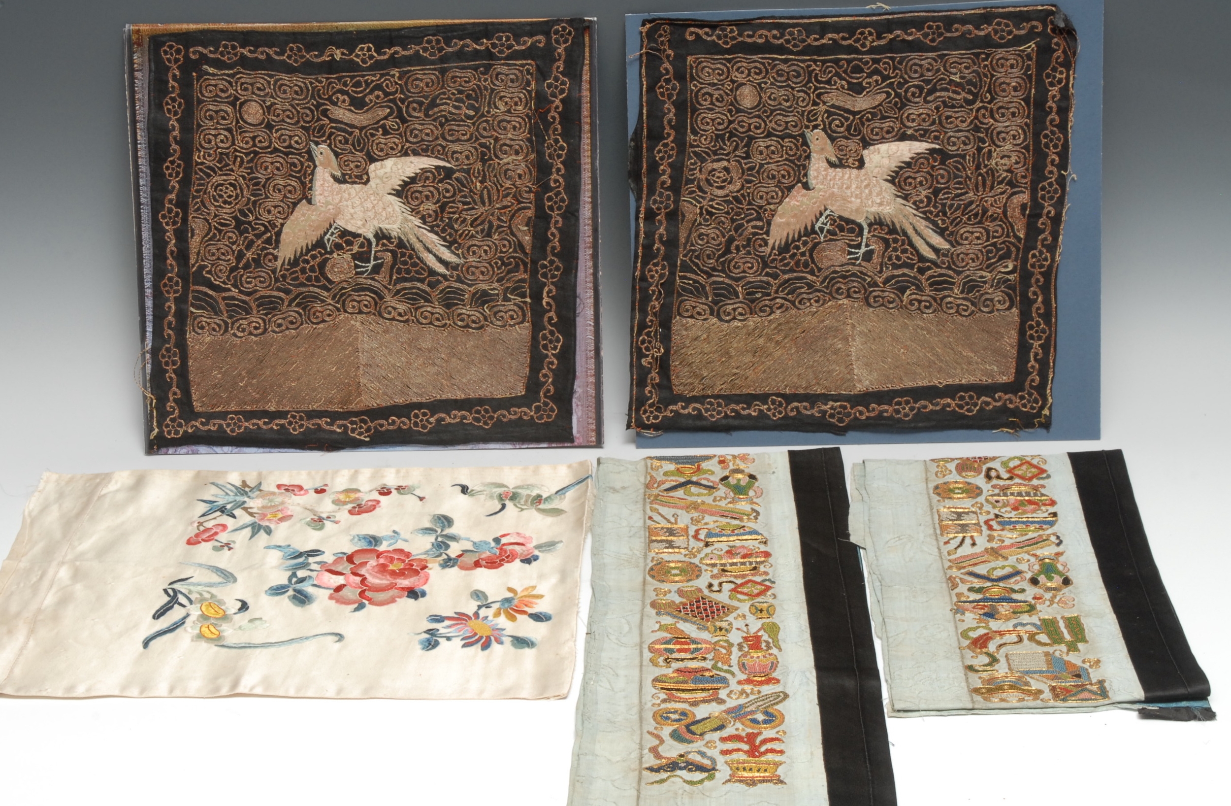A pair of Chinese rank badges or Mandarin squares, civillian, worked in gilt threads, 28cm x 30cm, late Qing Dynasty; other Chinese textiles, silk panels, etc