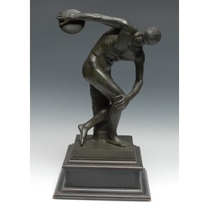 Grand Tour School (19th century), after the Antique, a verdigris patinated library bronze, The Discobolus of Myron, inscribed in the maquette Musee du Vatican, 39.5cm high, ebonised plinth, 49cm high overall