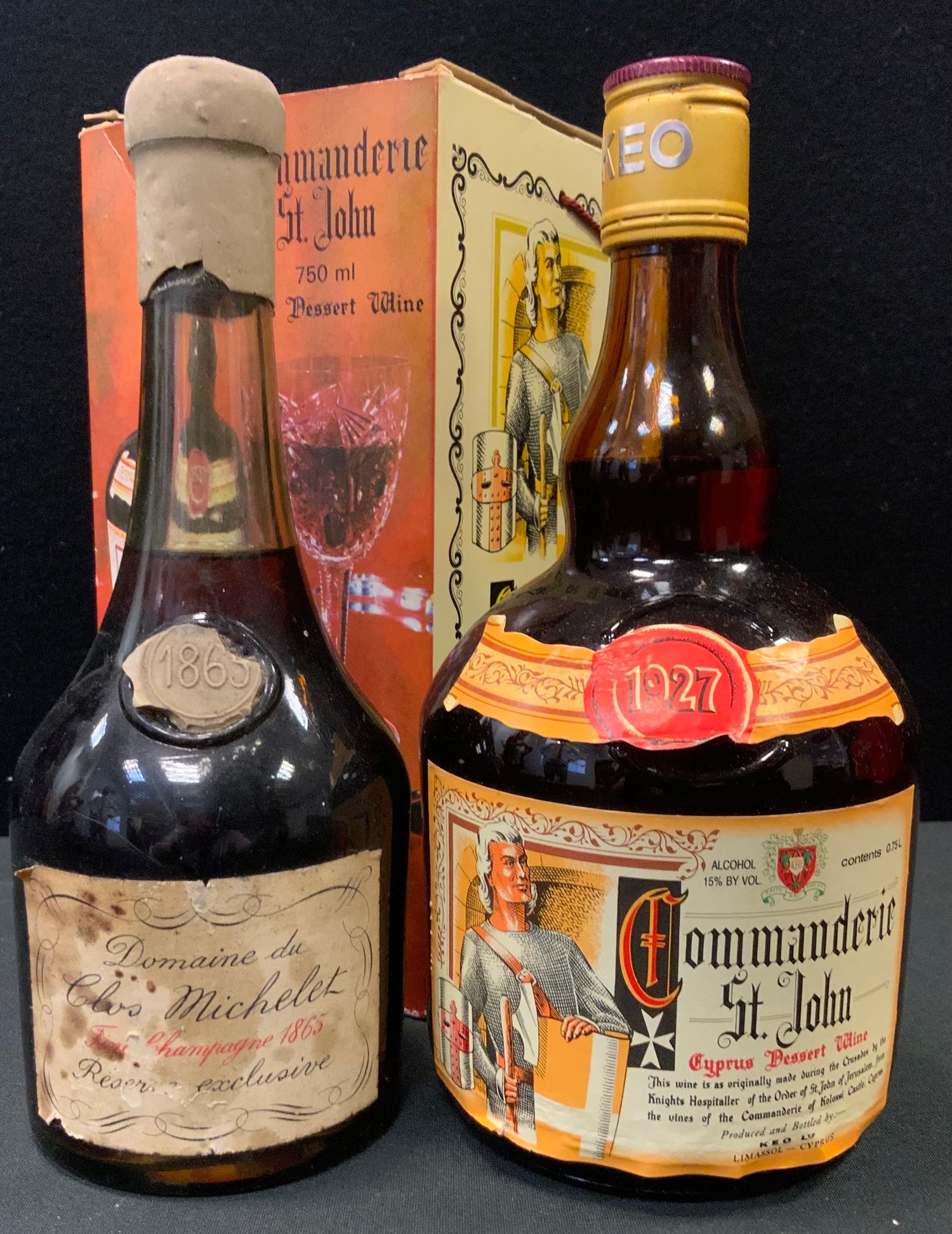 Wines and spirits - a bottle of Domaine du Clos Michelet Fine Champagne Cognac, 1865 reserve;  an exclusive 750 ml bottle of Commanderie St. John Cyprus dessert wine, boxed. (2)