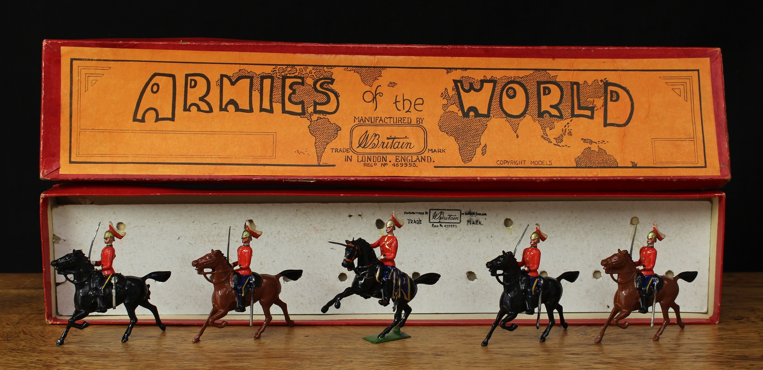 W Britain (Britains) Armies of the World No.1629 Lord Strathcona's Horse, comprising mounted officer on prancing horse and four mounted troopers, boxed with original inner cardboard display piece - orange label to box lid