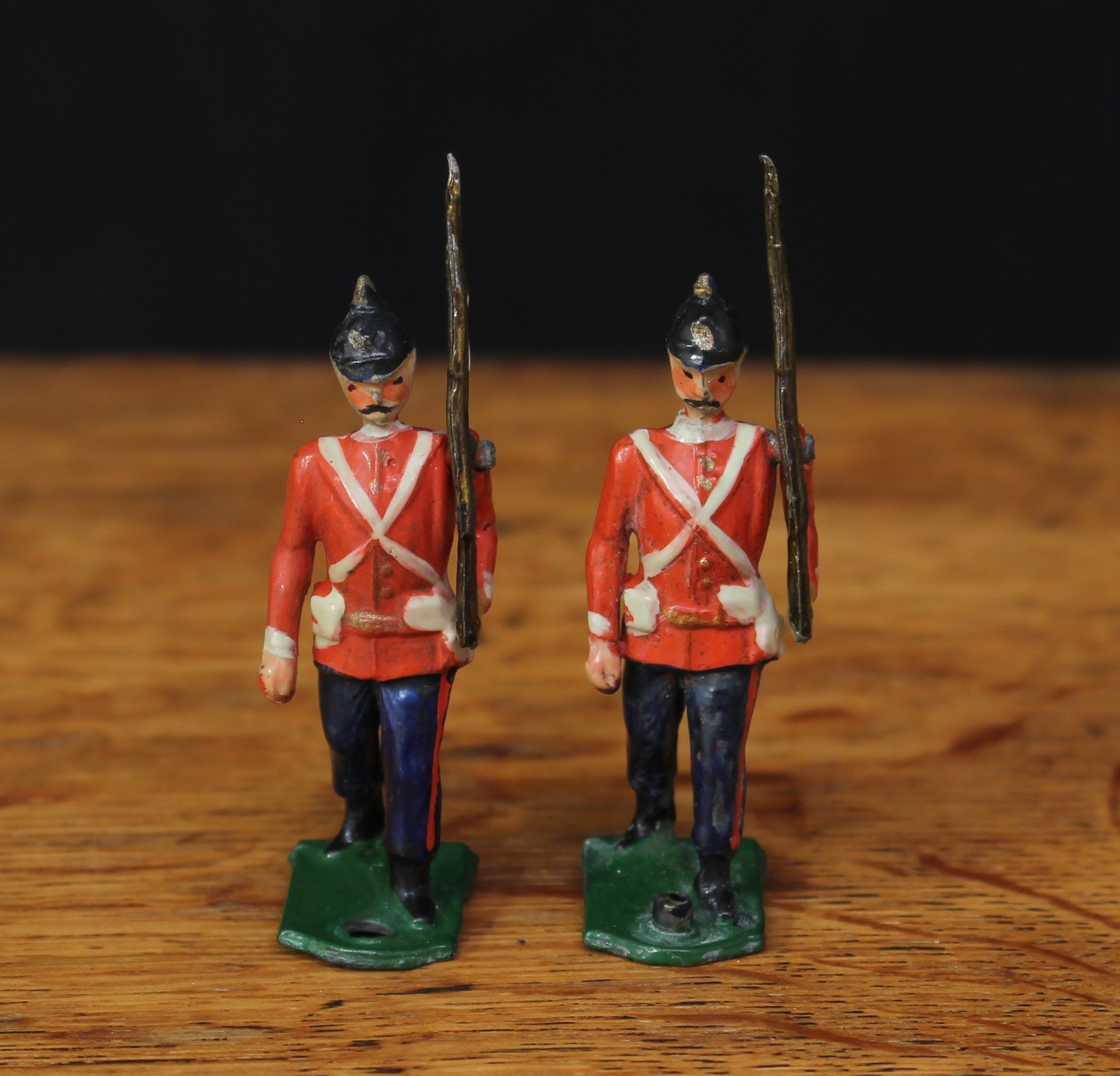 Abel, CD (Islington, London 1898-1914) two rare British Infantry drill display unit lead figures, both marching at the slope, each with special improved bases to fit the drill display frame, unboxed (2)
