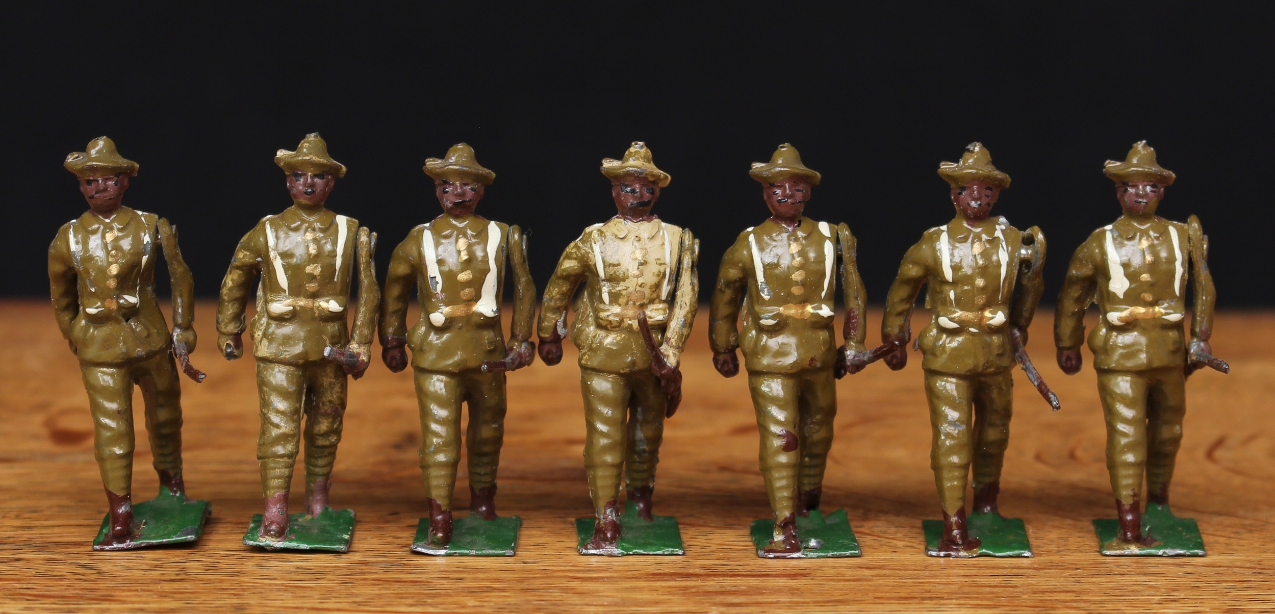 Reka (C W Baker) or similar 5.4mm West Indian or North African figures, comprising seven figures, each marching with rifles at the trail, movable arms, rectangular shaped bases, unboxed (7)