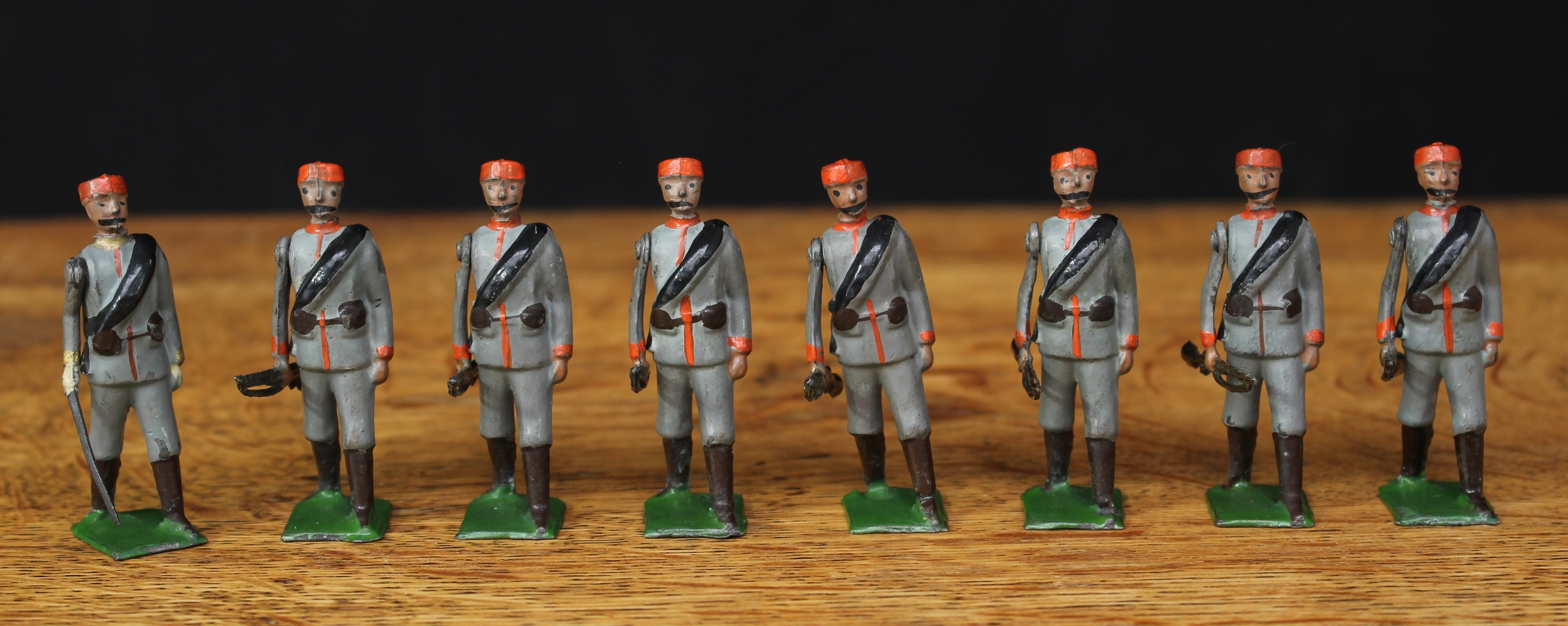 W Britain (Britains) No.174 Montenegrin Infantry, comprising officer with drawn sword and seven figures, each marching with rifles at the trail, unboxed (8)