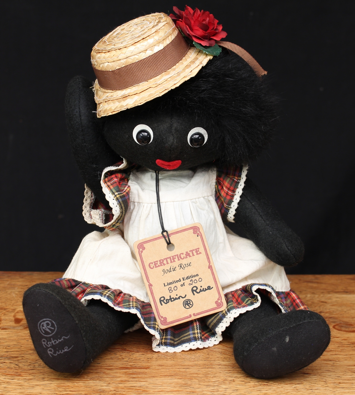 Robin Rive Countrylife Jodie Rose Golly, wearing a white cotton dress with tartan patterned edge, 36cm high with various swing tags, Limited Edition No.80 of 200