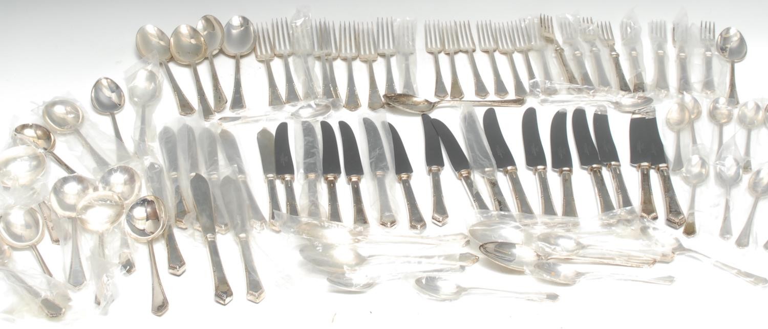 A canteen of silver Excellency pattern cutlery, comprising eight table knives, eight smaller knives, eight fish knives and forks, with steel blades, four table spoons, two ladles, eight soup spoons, eight forks, eight dessert spoons and forks, sixteen teaspoons, James Dixon and Sons, Sheffield 1972, 89oz excluding knives