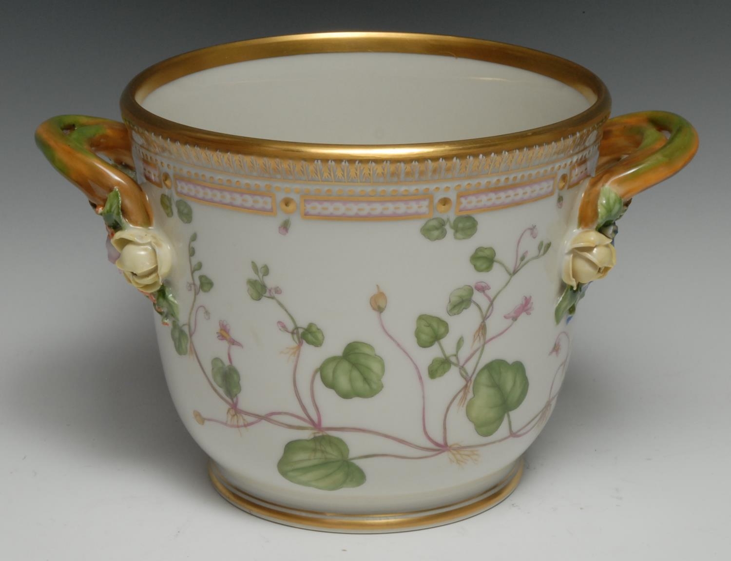 A Royal Copenhagen Flora Danica ice pail, painted with Antivihinum Cymbalania, titled to verso, the border picked out in gilt, 30cm diam, printed mark