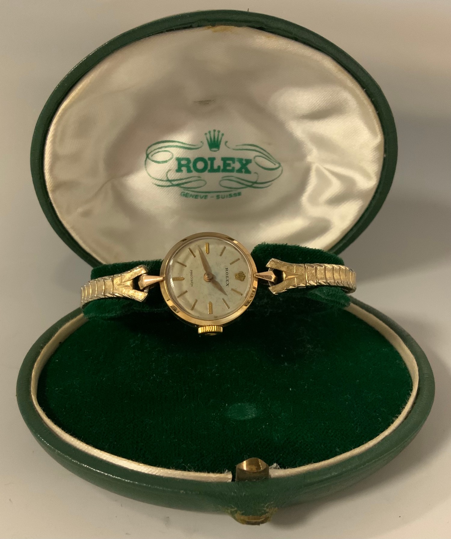 Rolex  - a Ladies Precision 9ct gold cased bracelet wristwatch , textured dial, block baton markers, manual 130 cal movement, 9ct gold case, serial No 10890, London 1960, associated bracelet, original green leather case
