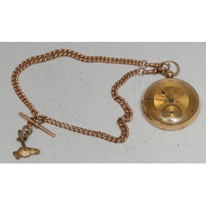 An 18ct gold open face pocket watch, Roman numerals, subsidiary seconds dial, Chester 1860, an equine gilt brass horse mask winding key; with a 9ct rose gold Albert chain, 47.6g