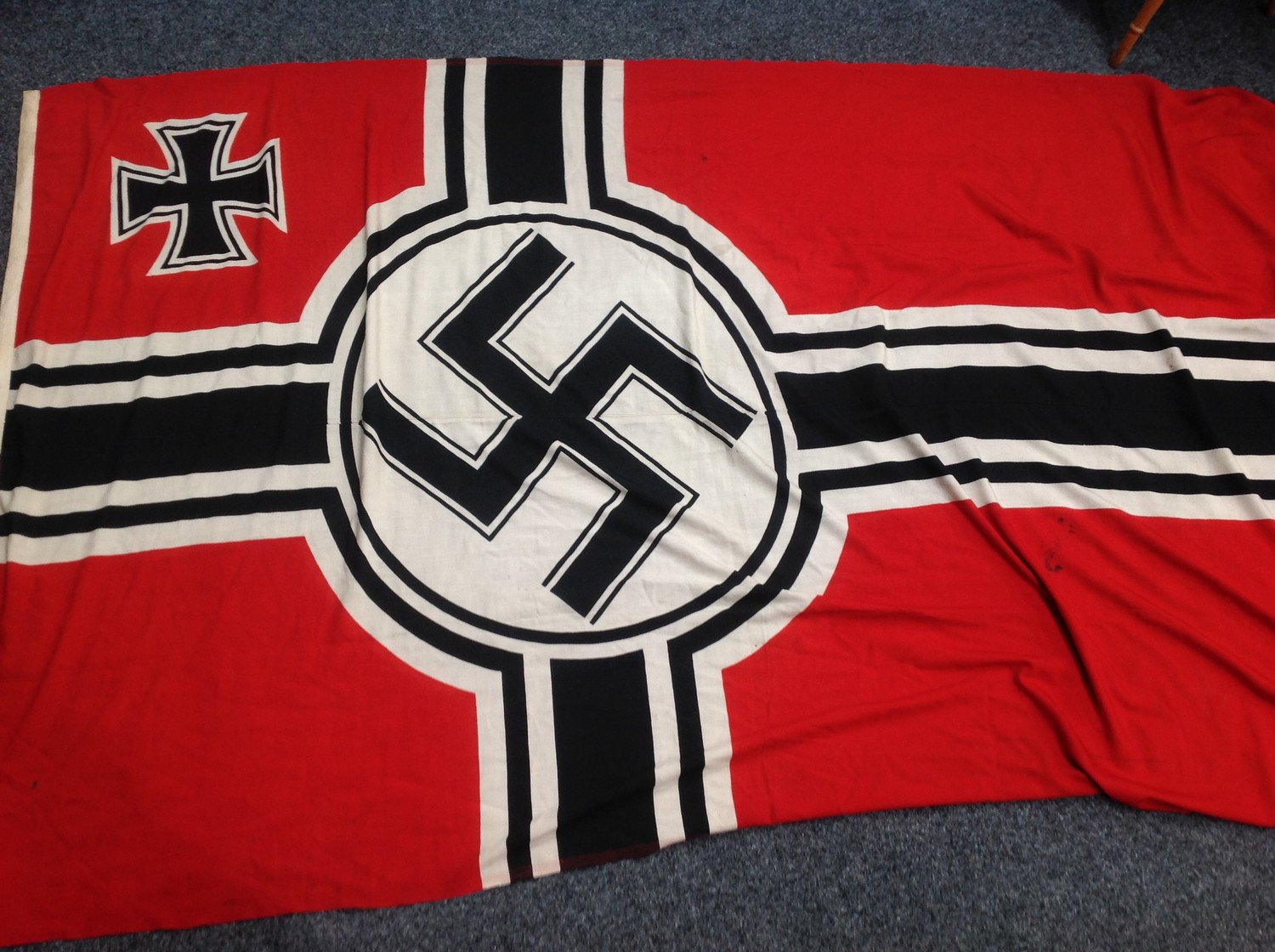 WW2 Third Reich Kreigsmarine Reichkreigsflagge size 200cm x 335cm. This size would have been for a Destroyer or a Cruiser. Well marked with KM acceptance stamp of Eagle over M, maker marked. Has veterans name written in black ink.