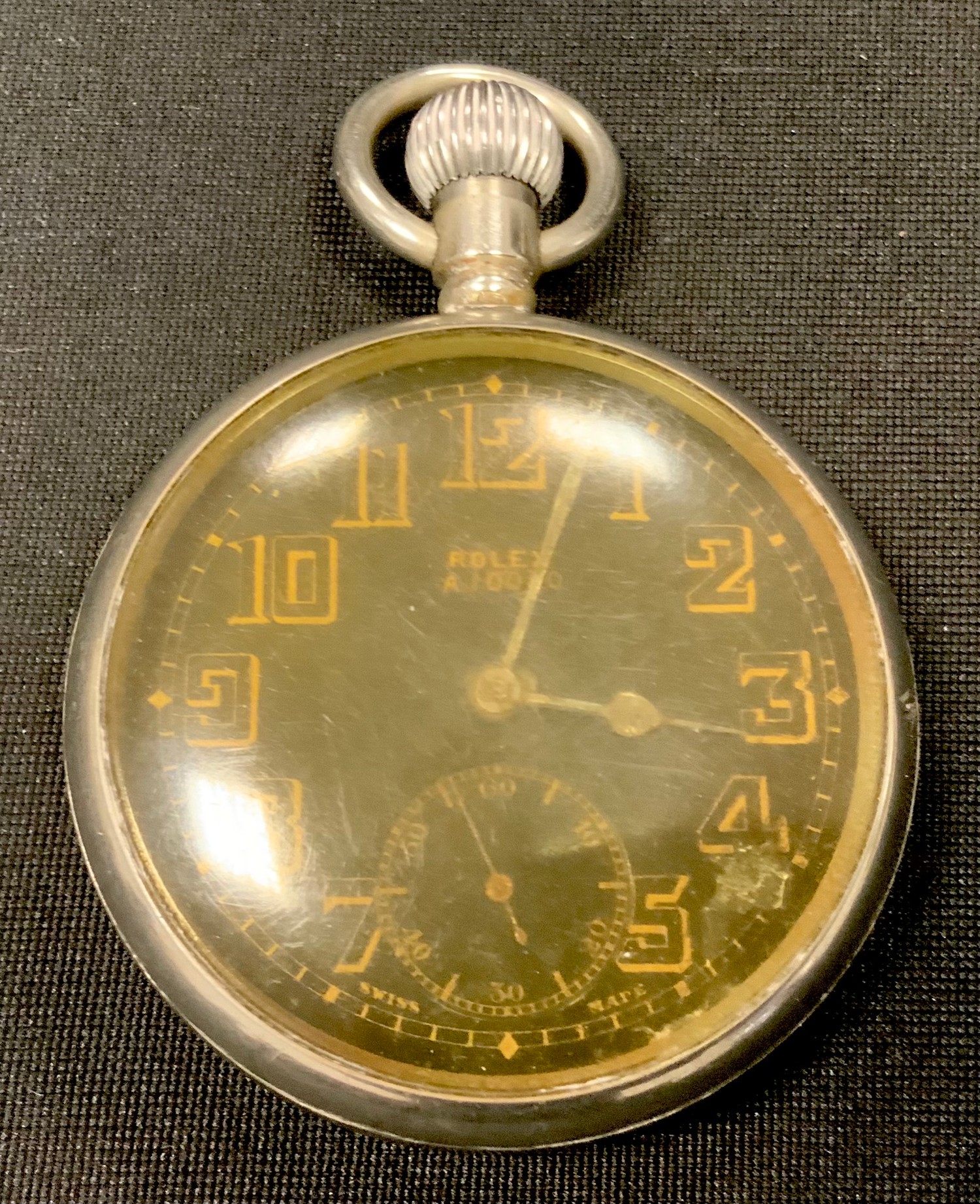 WW2 'Military' style private purchase Rolex A10030 open faced pocket watch, black enamel dial gold outlined Arabic numerals, subsidiary second dial, Rolex 15 rubies movement, signed Rolex and marked 066, the screw case back marked inside 'Rolex, 31 Records Universels, Geneve Suisse’. The reverse of the case is plain.