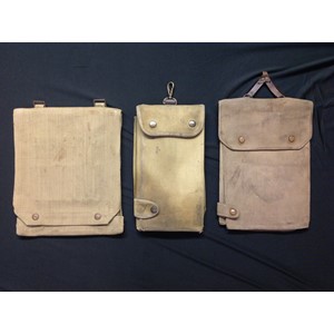 WW2 British Army Map case collection of three difference map cases: 1937 pattern case maker marked "M&S" and dated 1944: Small folding map case often refered to as an Airborne or Jungle map case dated 1944: a private purchase officers map case, no date but maker marked "The Allies Regd GFR London". Clip missing from leather hanger (3)