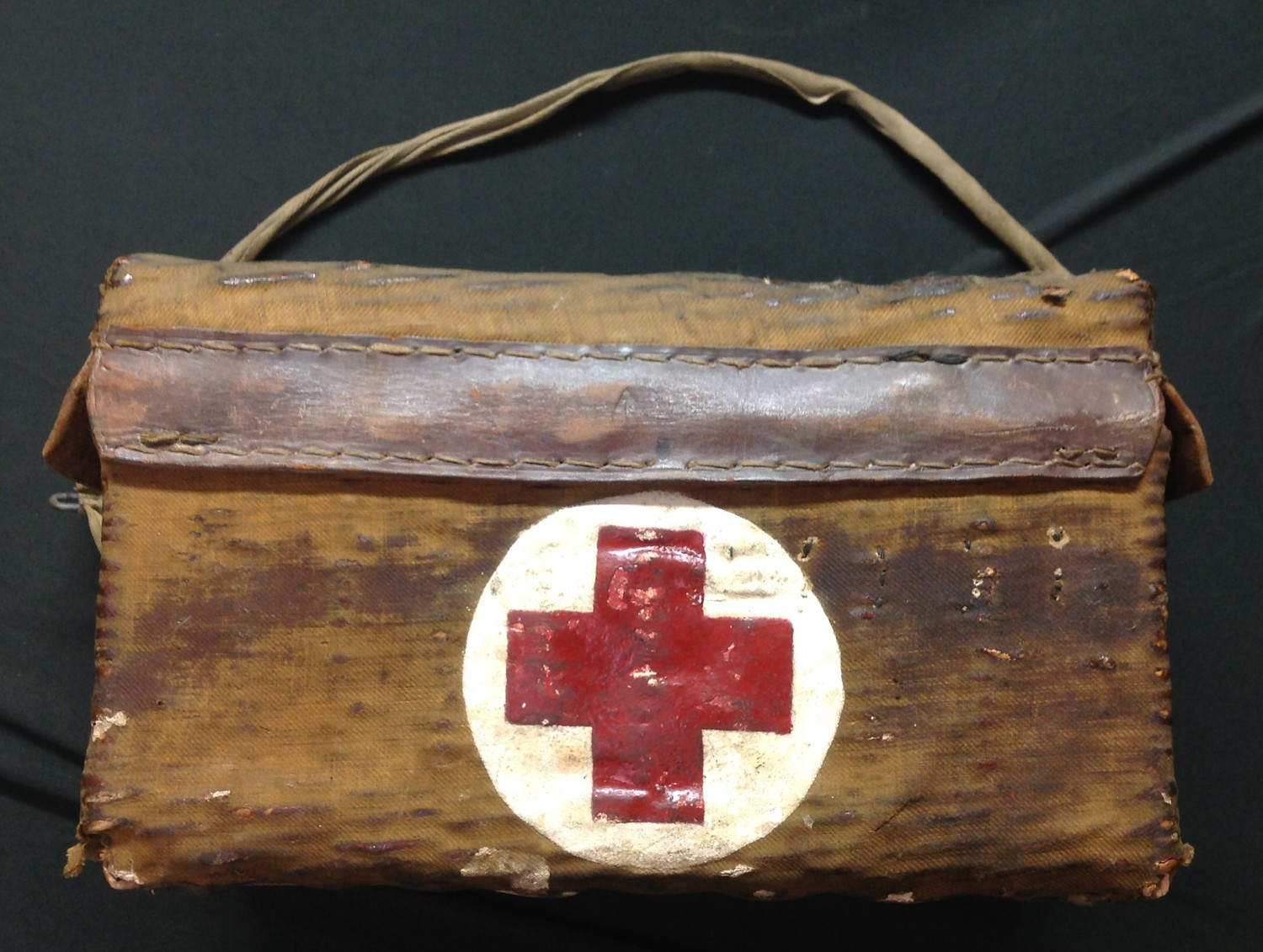 WW2 British Army Rare RAMC Medical Companion wicker basket. WD Broad Arrow marked the the leather sides of the lid. Includes "Instruments Regimental Pannier" containing 7 original medical instruments: and a quantity of bandages in original packaging of various dates and a tin of Flexoplast bandage. No date or makers marks to pannier.