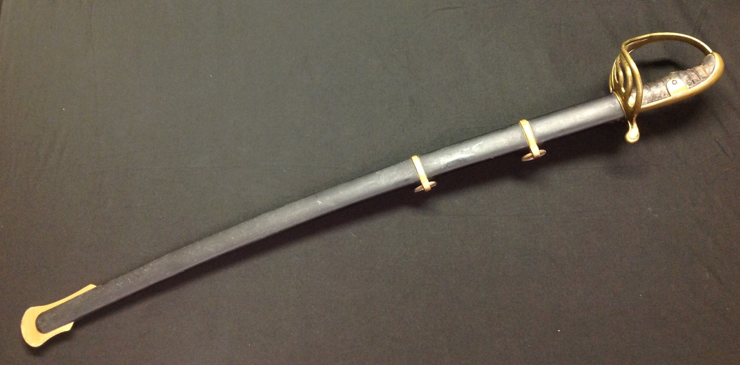 Enfield made Sword with single edged fullered blade 765mm in length. Spine of blade marked "Enfield". Leather bound wooden grip. Brass Guard. Overall length 910mm. Complete with steel scabbard with twin suspension rings. Repainted black and gold.
