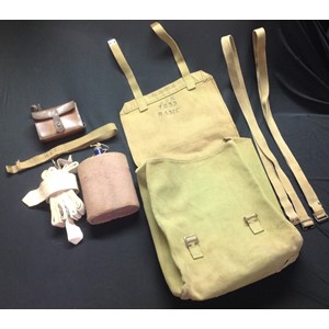 WW1 British 1908 Pattern Webbing Large Pack, maker marked and dated "MECO 1915" along with unit markings "6SX" "7633 RAMC": two web straps: water bottle with cover: RFC marked web strap (cut down) small leather pouch with alloy container with: four unmarked white canvas straps, possibly medical. (Q)
