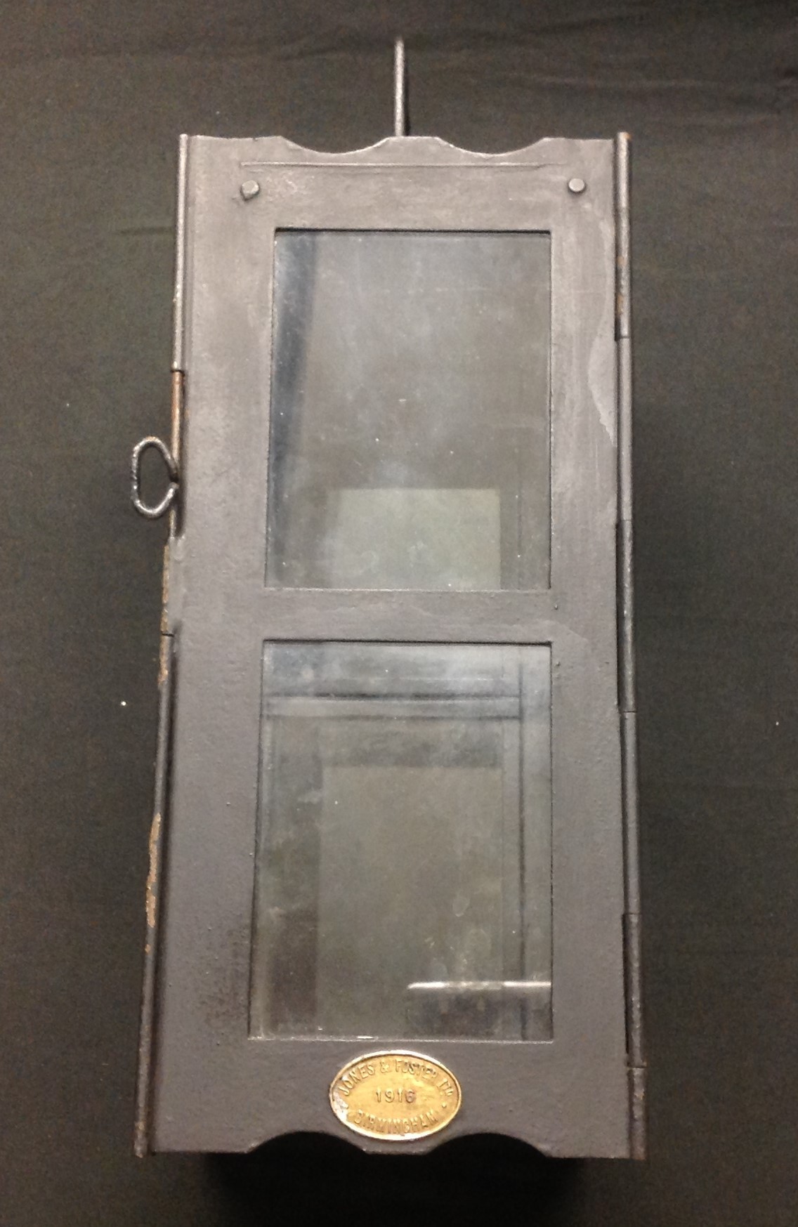 WW1 British Army Folding Candle Lantern. Has been restored with new replacement glass. Makers name along with date a on brass plaque "Jones & Foster Ltd, Birmingham 1916". Height  with handle unfolded 390mm, width 147mm.