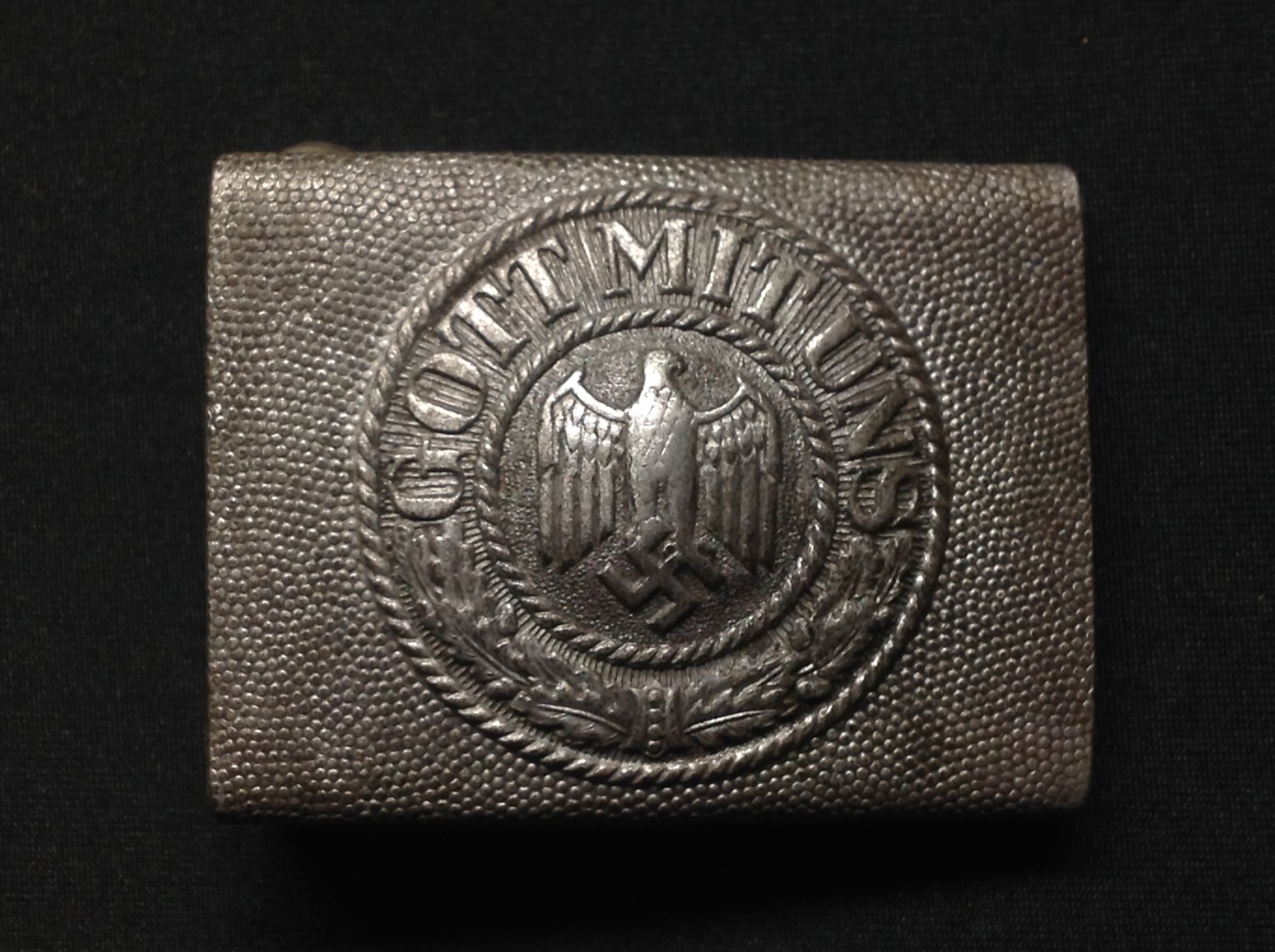 WW2 Third Reich Heer Belt and Buckle. Buckle is made of alloy and is maker marked "F.R.O". Belt leather is size marked "90".