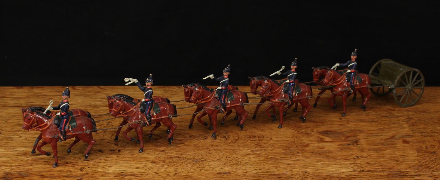 W Britain (Britains) No.211 Heavy Howitzer team, comprising a ten horse team with five drivers, each holding a whip, khaki green limber with lift up seat and extended towing hook, unboxed