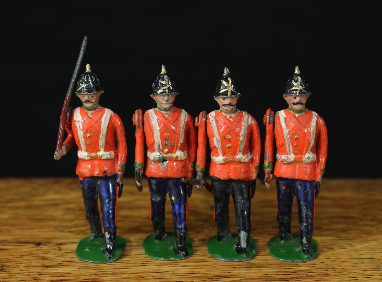 Hanks Brothers (London), four British Infantry of the line figures, marching at the slope, movable arms, unmarked oval bases, unboxed (4)