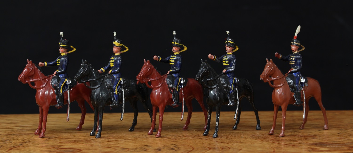 W Britain (Britains) No.315 10th Hussars, comprising mounted empty handed officer and four mounted empty handed troopers, each with movable arms, unboxed (5)