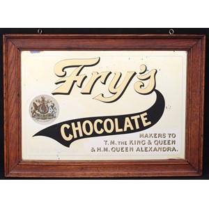 Advertising, Confectionery and Chocolate - an early 20th century Fry's rectangular point of sale advertising mirror, "Fry's CHOCOLATE, 300 GOLD MEDALS & c., MAKERS TO T.M. THE KING & QUEEN & H.M. QUEEN ALEXANDRA", gold and black lettering, oak frame stamped 'J.S.FRY & SONS LTD', 39cm x 54cm (measurements including frame)