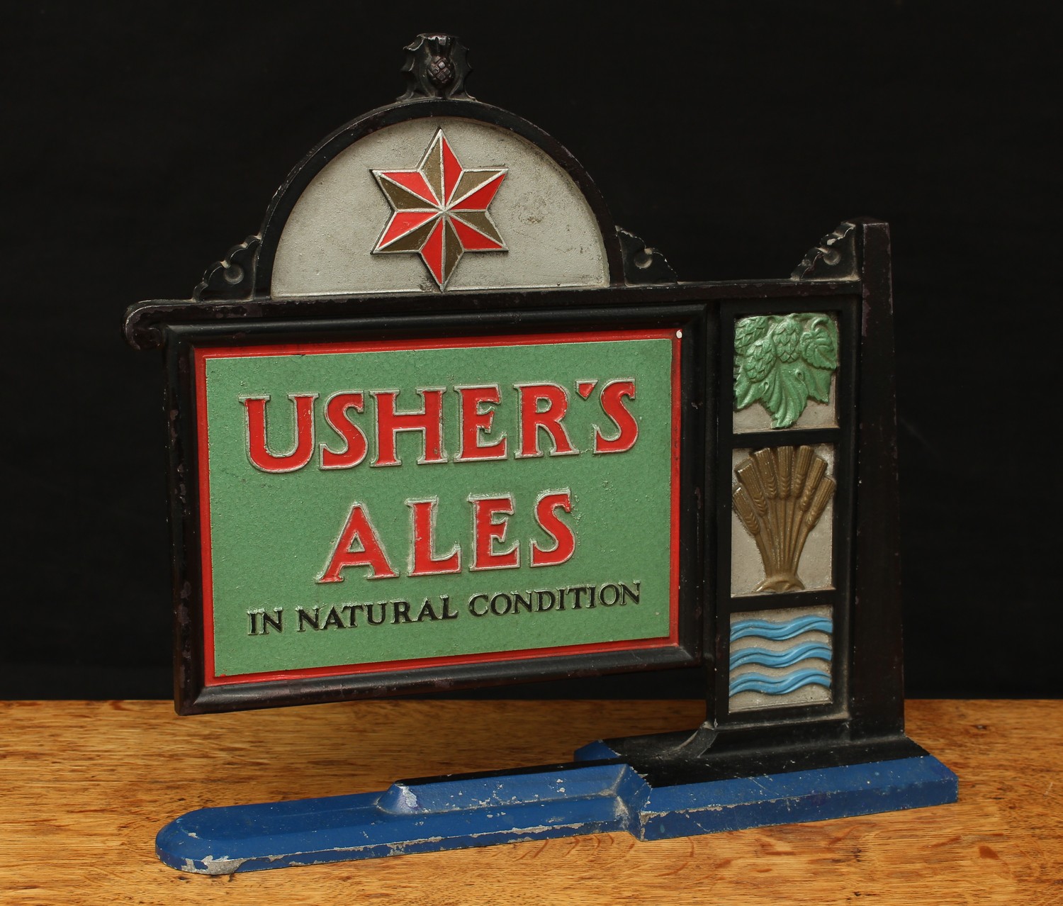 Advertising, Breweriana - a 1930's Usher's Ales (Trowbridge) painted cast alloy advertising sign, the border cast with hops, malted barley and water, "Usher's Ales In Natural Condition", 32cm high, 33.5cm wide, 9cm deep