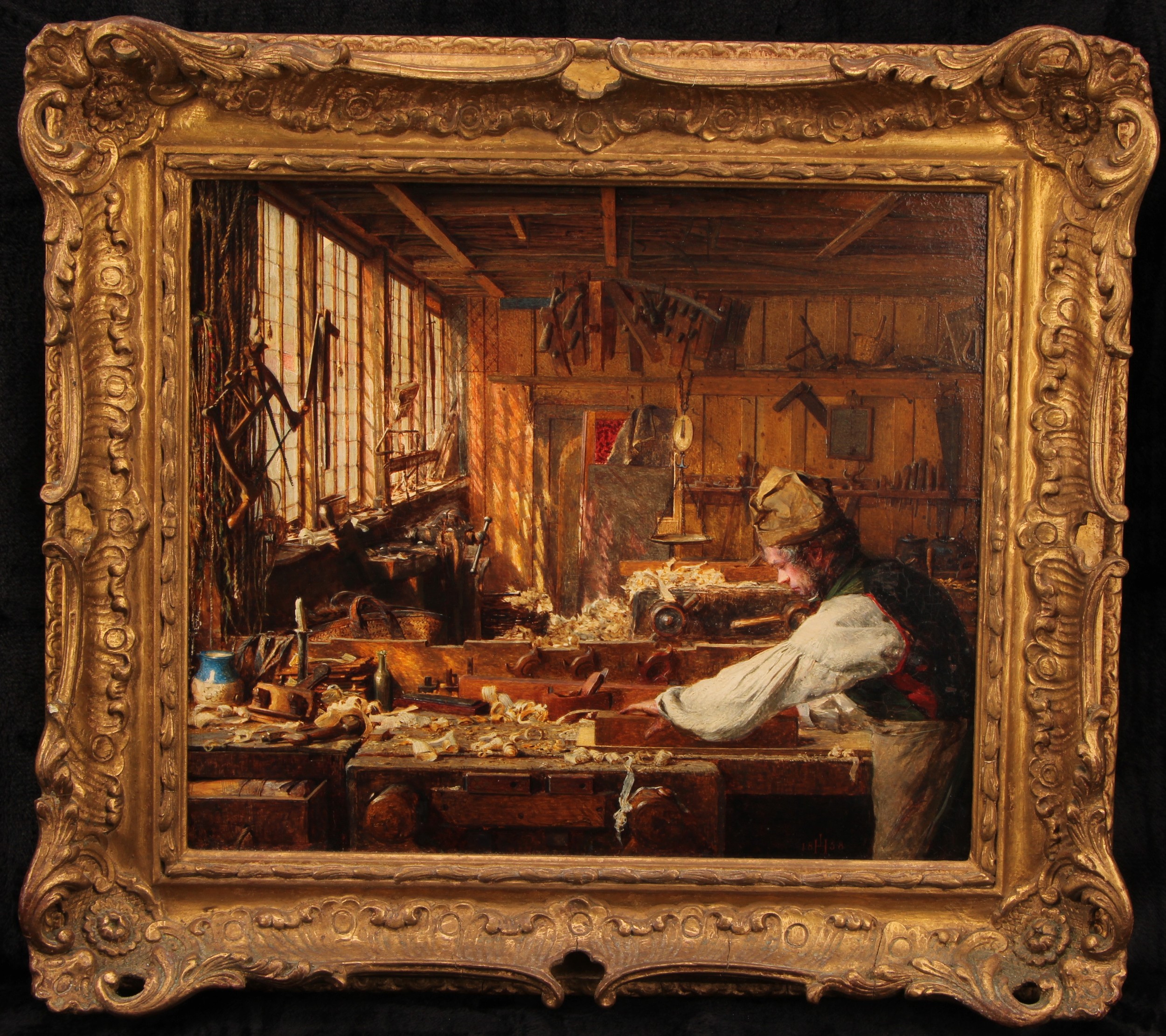 James Hayllar (1829–1920) Carpenter’s Workshop signed with monogram, dated 1858, label to verso, oil on panel, 29cm x 34cm