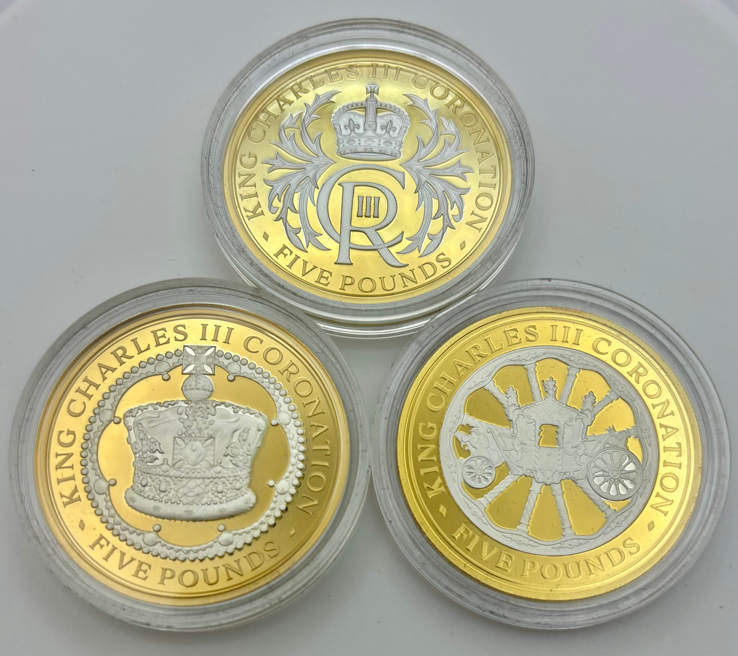 Gold proof coins - 24ct gold King Charles III Coronation Five Pound Coin Set, comprising three five pound coins, each 31.1g, 2023, limited edition 14/25, lined case and cardboard sleeve