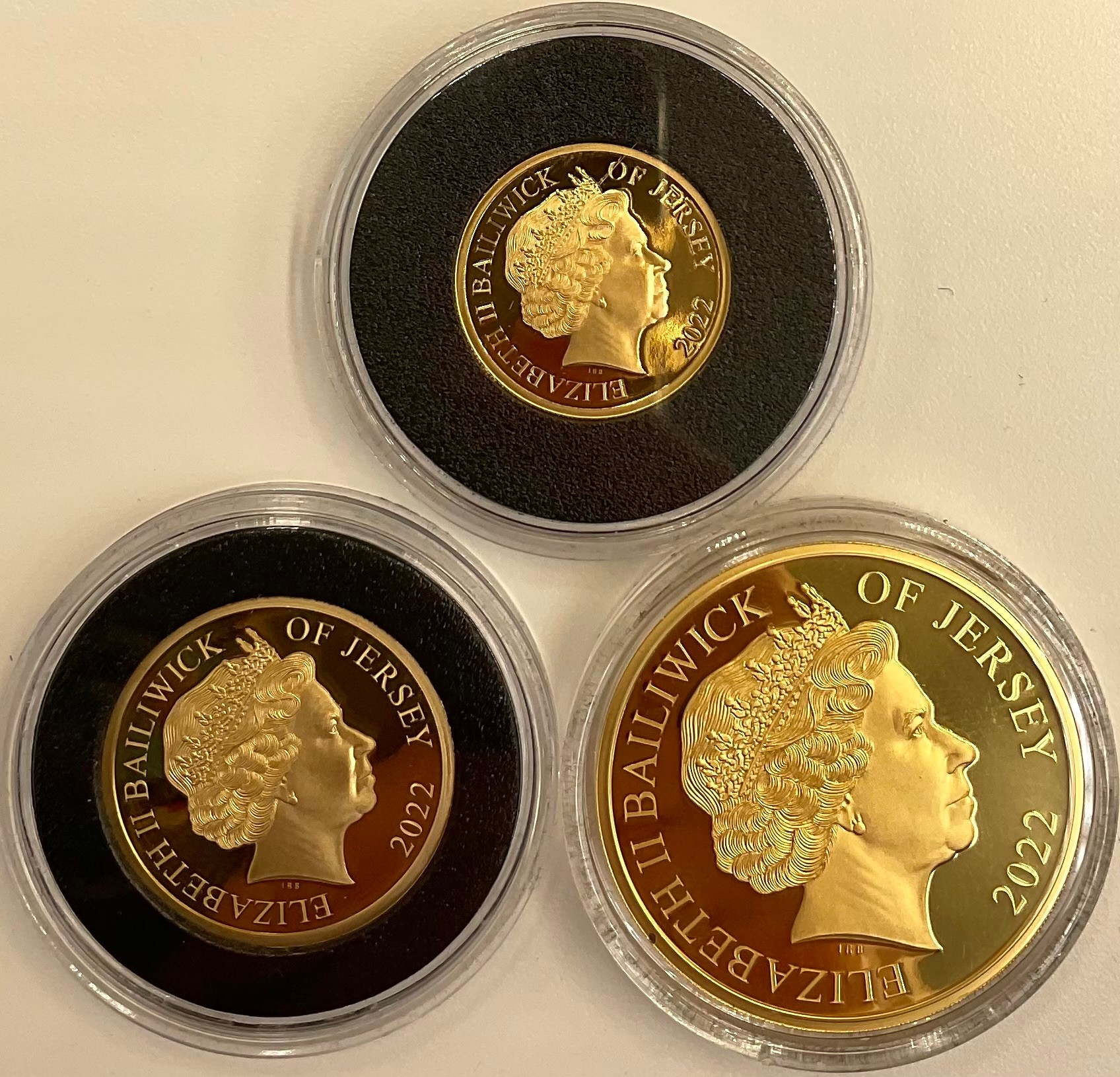 Gold proof coins - 22ct gold Trooping the Colour Fractional Set, comprising one pound coin, 7.98g, two pound coin, 15.98g, five pound coin, 31.1g, limited edition of 30, 2022, lined case and cardboard sleeve