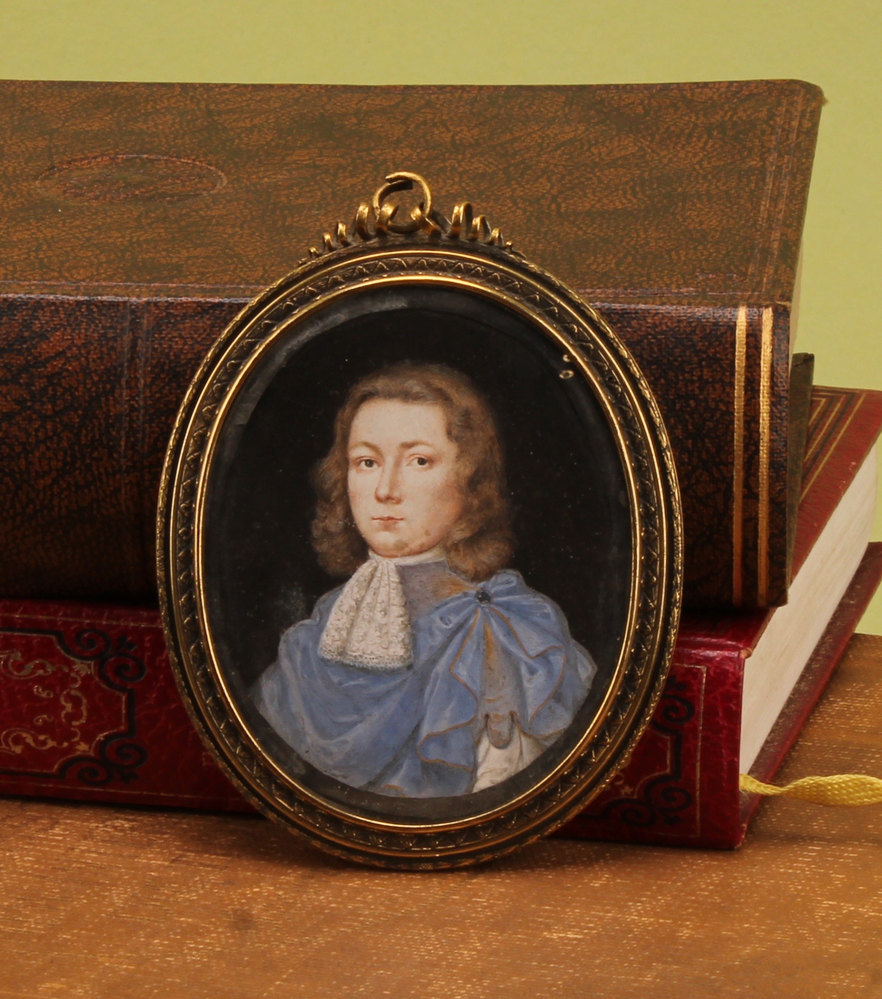 English School (19th century), an oval portrait miniature mourning pendant, of a young man of the Blake family of Bury St Edmunds (Suffolk), watercolour on ivory, 7cm x 5.5cm  Provenance: inherited by the vendor by direct descent.  Ivory Submission Reference REJBT6DL