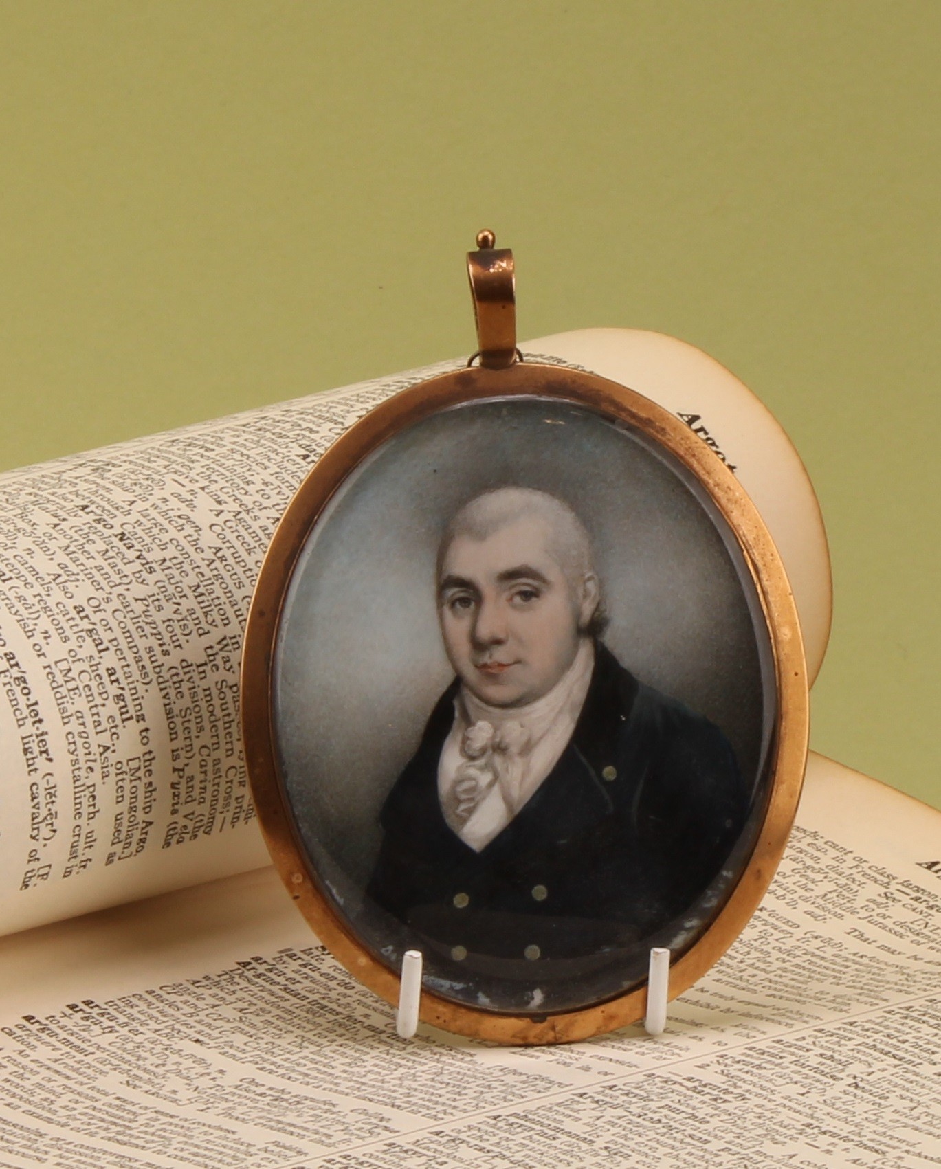English School (19th century), an oval portrait miniature mourning pendant, of a gentleman of the Blake family of Bury St Edmunds (Suffolk), watercolour on ivory, 5.5cm x 7cm, lock of hair to verso  Provenance: inherited by the vendor by direct descent.  Ivory Submission Reference N8DEQW3M