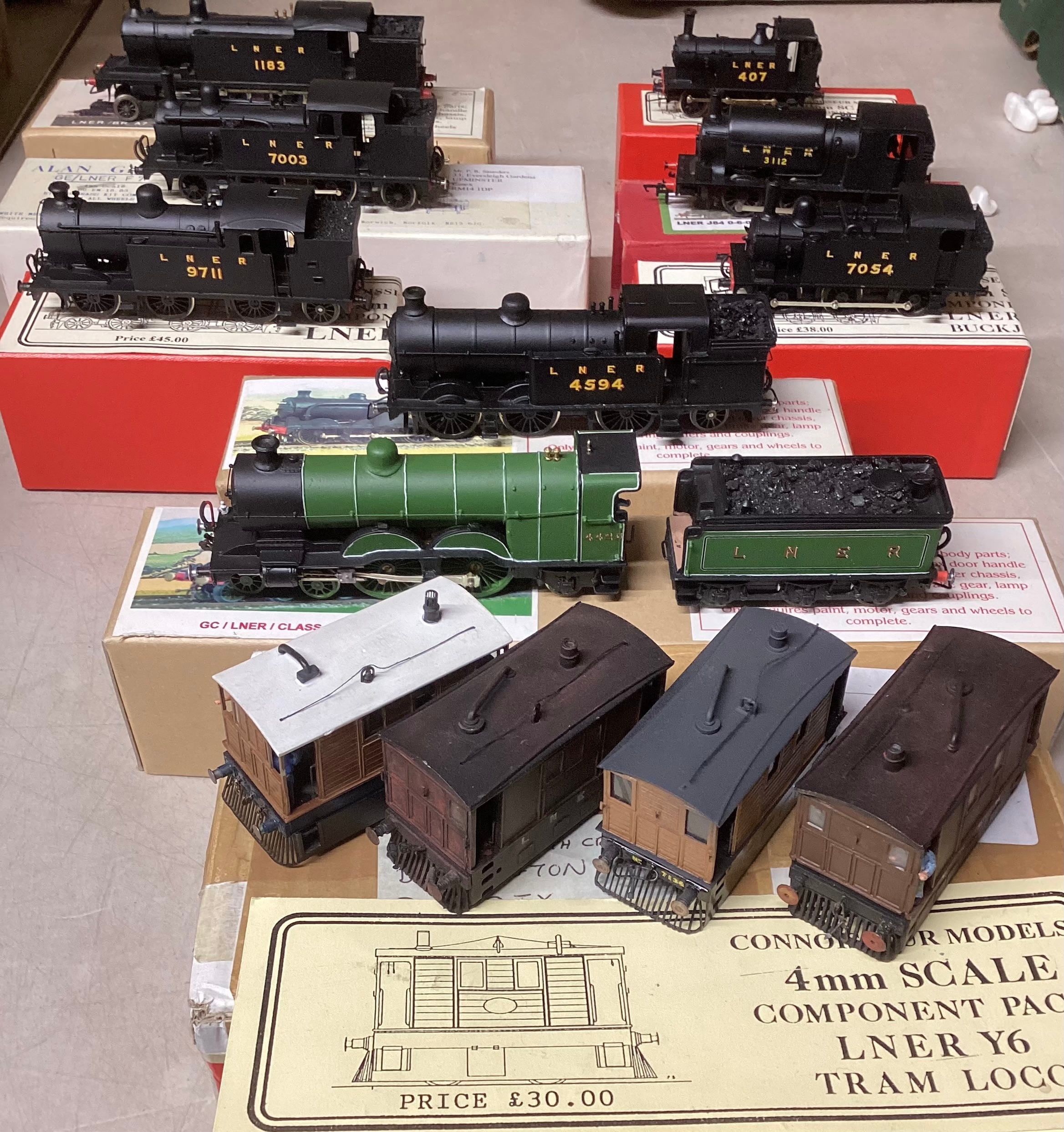Fine Built model trains , principally LNER  Locos with kit boxes and a further Green LNER Tender and Loco with box b hilt train and  4 connoisseur LNER 4mm scale Tram Locos. ( selection)