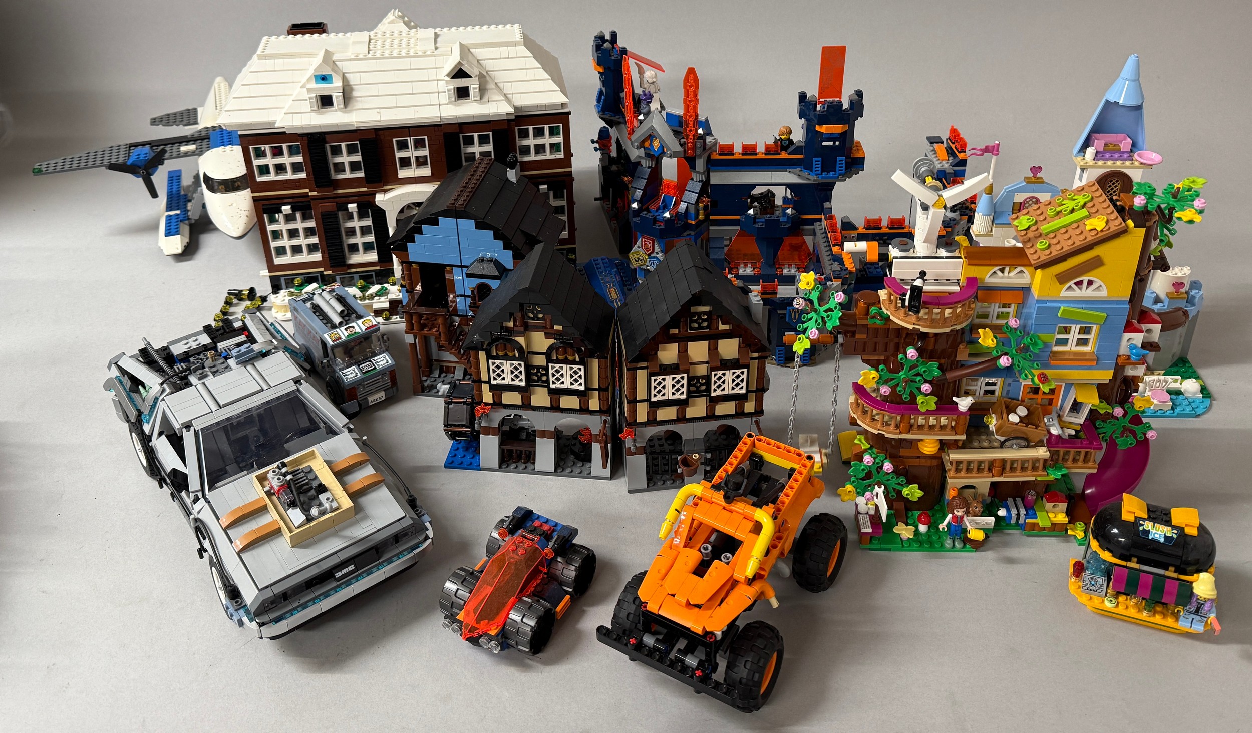 Lego - Ideas, 21330 Home Alone, unboxed; 10193 Medieval Market Village, unboxed; Friends, 41703 Friendship Tree House, unboxed; 70357 Knighton Castle, unboxed; 10300 Back to the Future Time Machine, unboxed; etc (qty)  (21330) £259.99RRP.  (10193) Retired product. Previously £71.99RRP.  (41703) Retired product. Previously £69.99RRP.  (70357) Retired product. Previously 109.99RRP.  (10300) £169.99RRP.  This lot is part of a collection from a deceased estate. All models were constructed and remained constructed in the home and as such we do not have boxes or instruction manuals and the models are therefore sold as seen.
