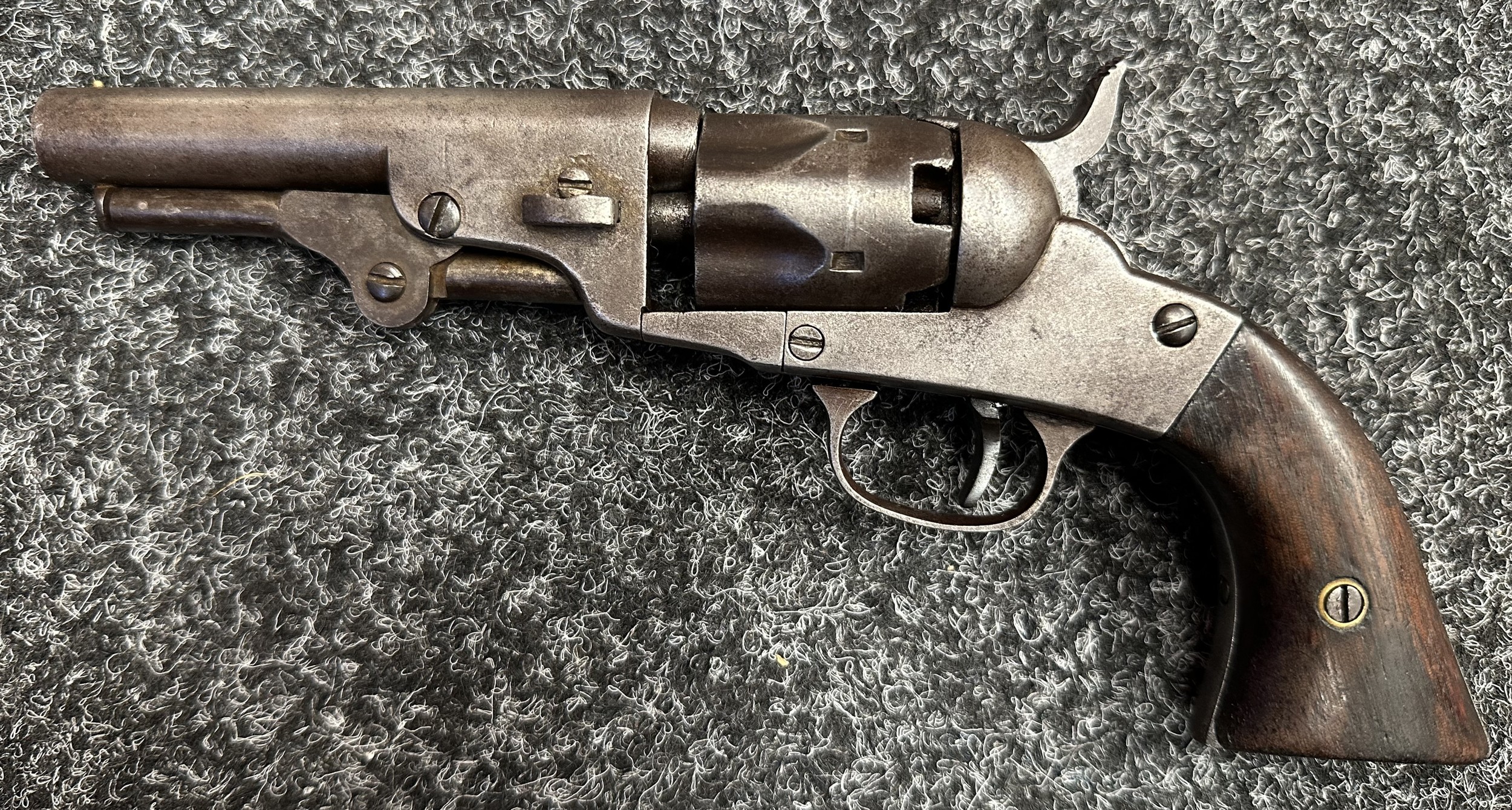 US Civil War Era .31 Cal Percussion Cap 2nd Model Pocket Revolver by "Bacon MFG Co. Norwich, Co" serial number 100 of approx. 3000 guns made. Serial numbered under barrel and on ramrod. 100mm long barrel. Overall length 223mm. Working single action action which holds at both full and half cock. One nipple missing from cylinder.  NOTE: Section 58 (2) No licence required in the UK.